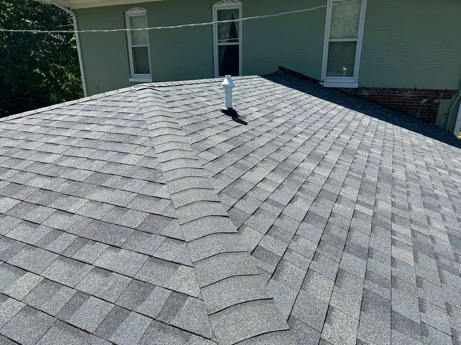 Roof surface detail during inspection by RJ Roofing Southwest Missouri