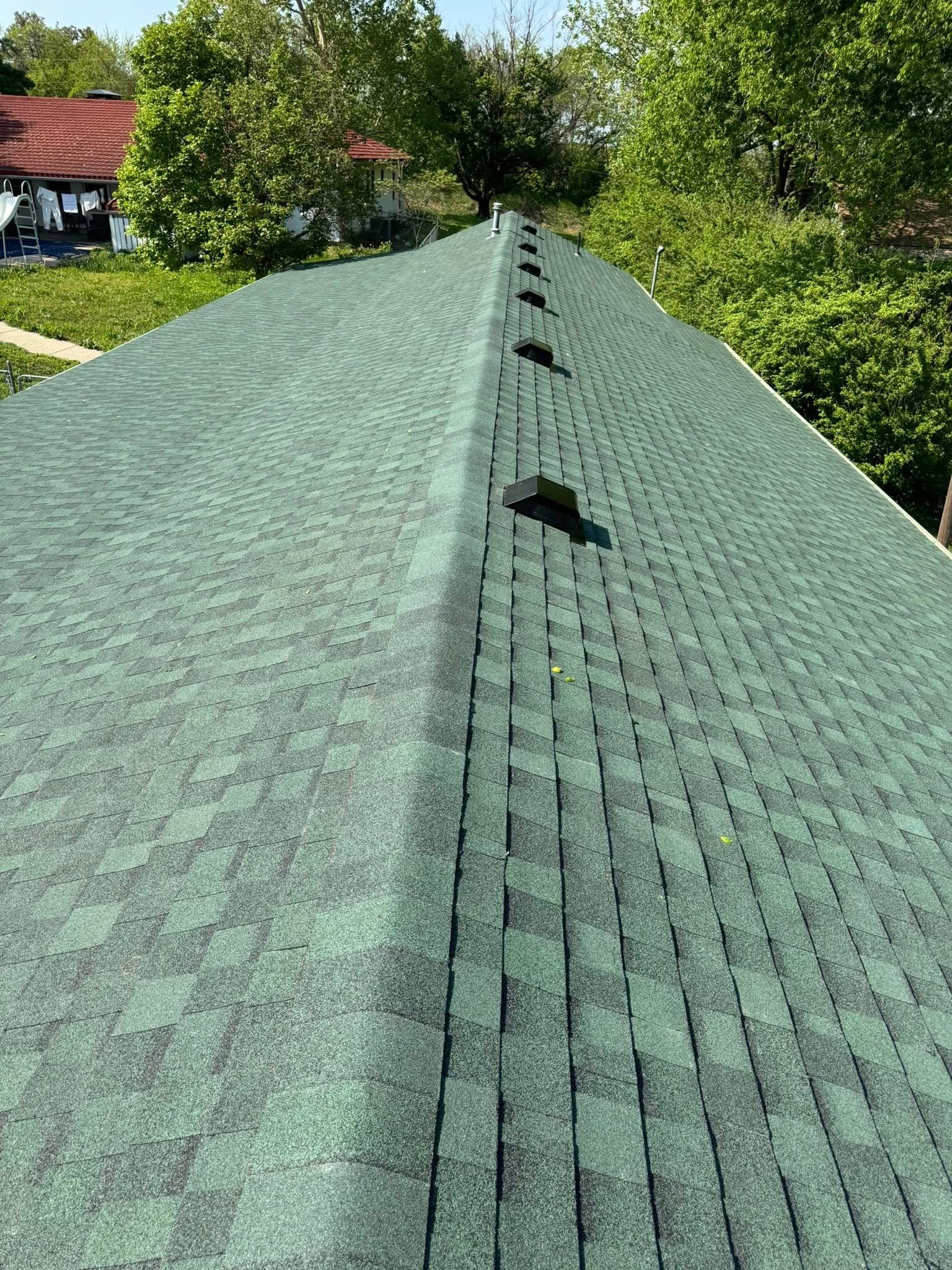 Close-up of roof shingles inspected by RJ Roofing in Southwest Missouri